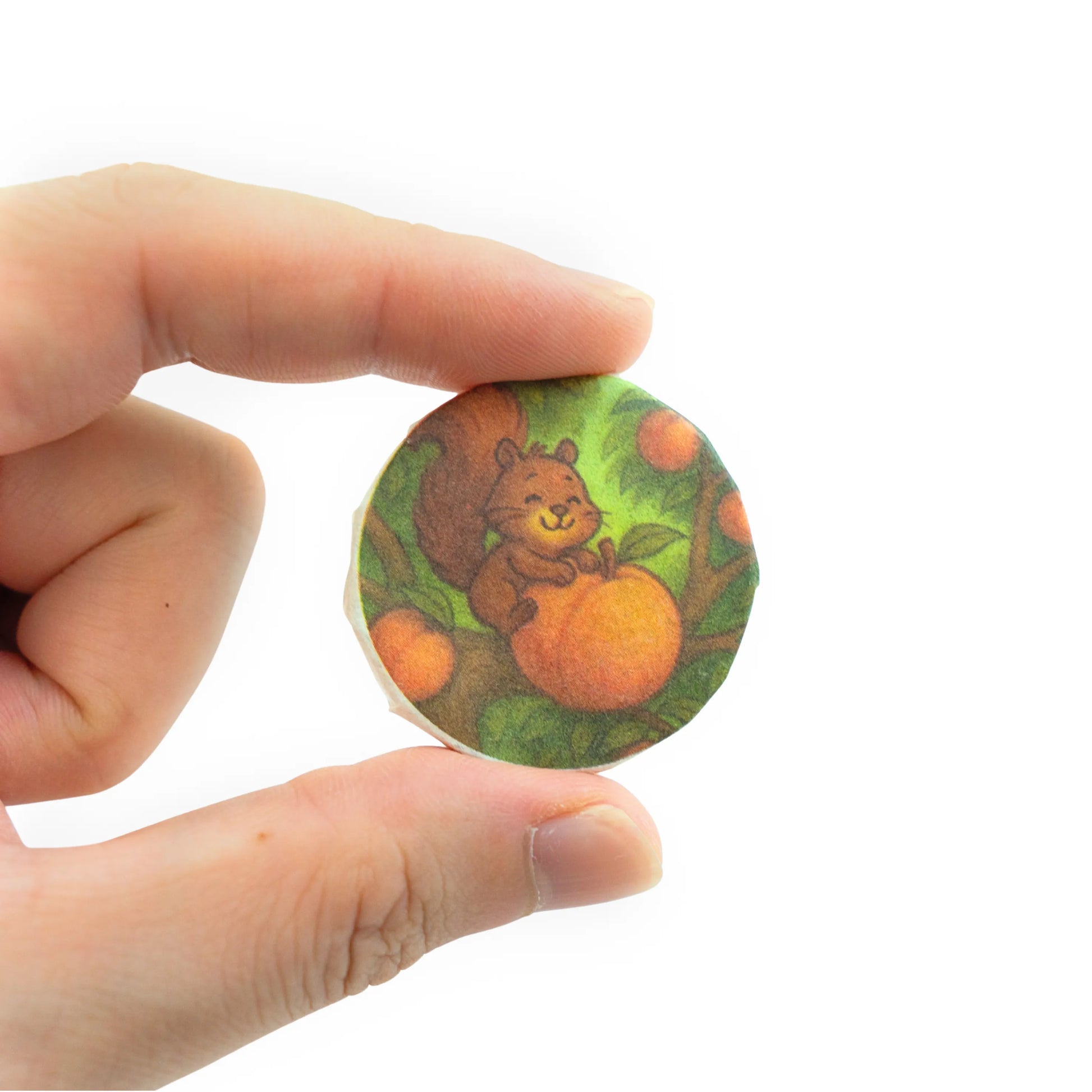 Rooteas fruity lapsang souchong black tea coin in hand
